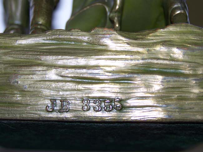 A fine and rare pair of Antique Bookends circa 1930 depicting a Pioneer Woman and Her Son — image 3